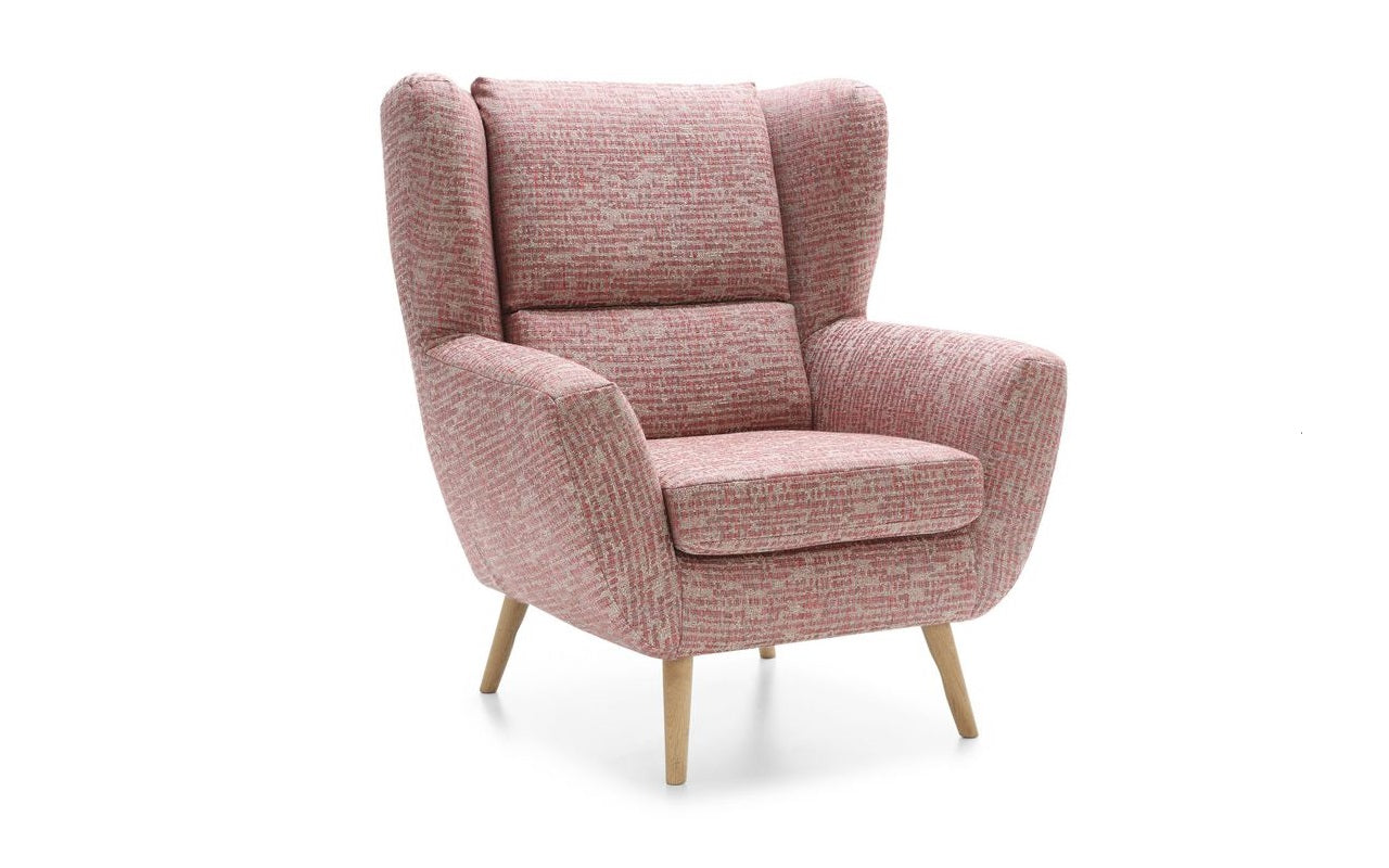 Rózsaszín, cirmos szövet füles fotel.