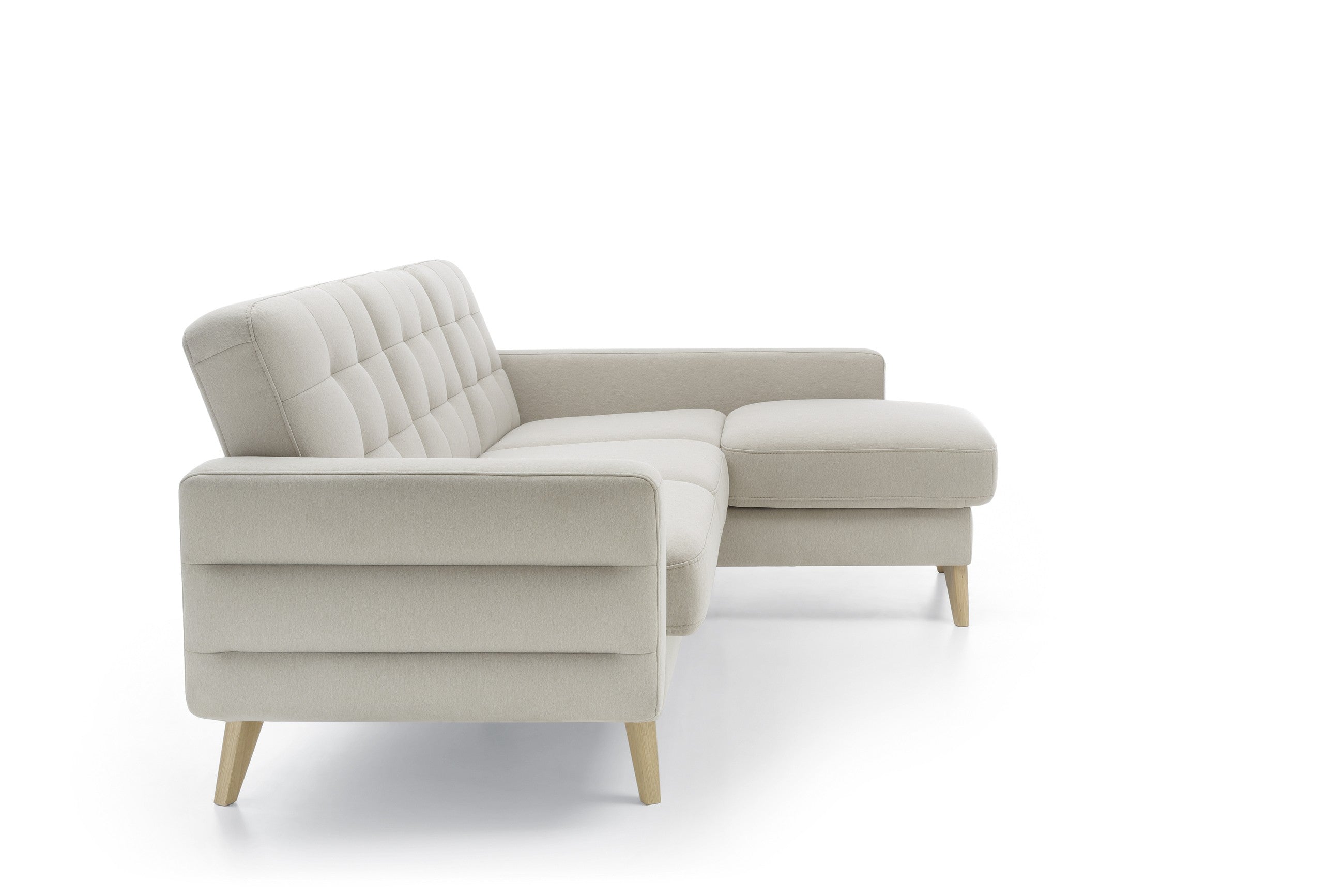 Ágyneműtartós sarokkanapé tűzött háttámlával.