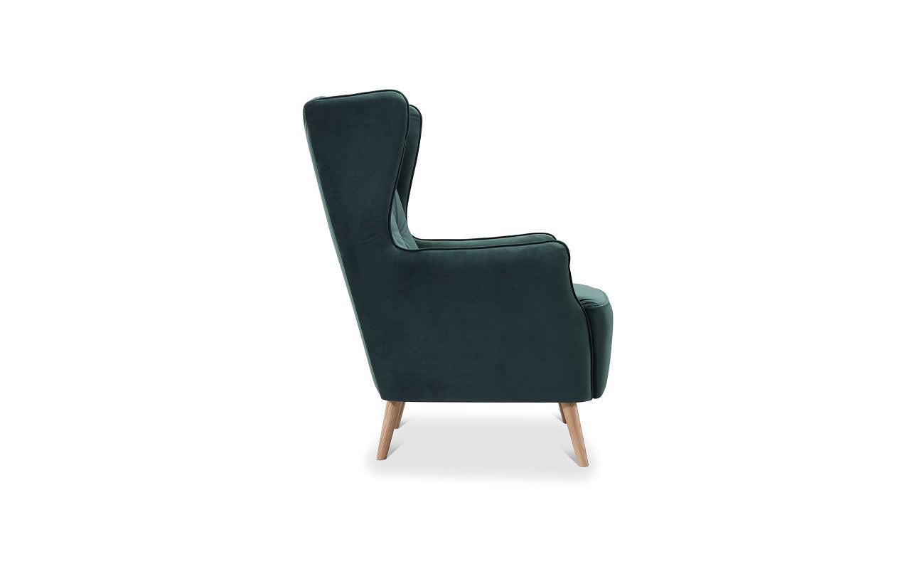 Zöld füles fotel tölgyfa lábbal.