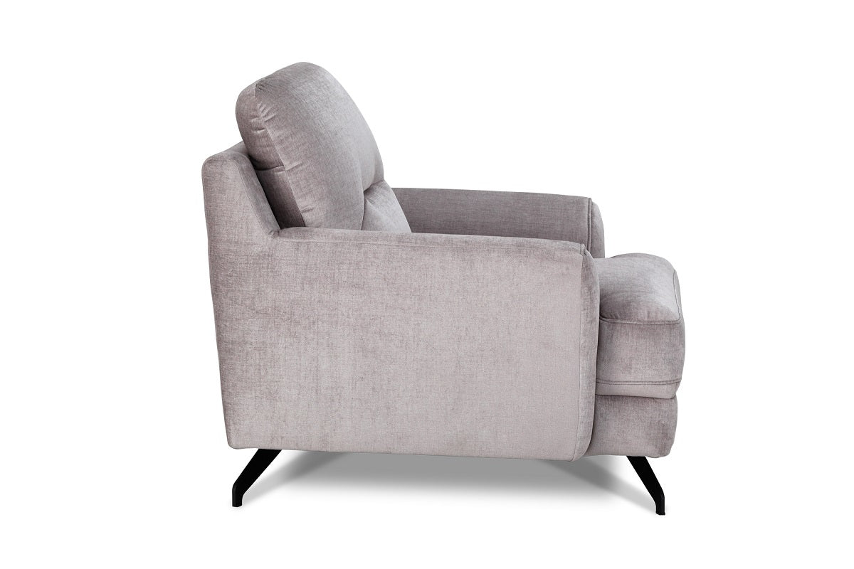 Süppedős szürke bársony fotel, fekete fém lábbal.