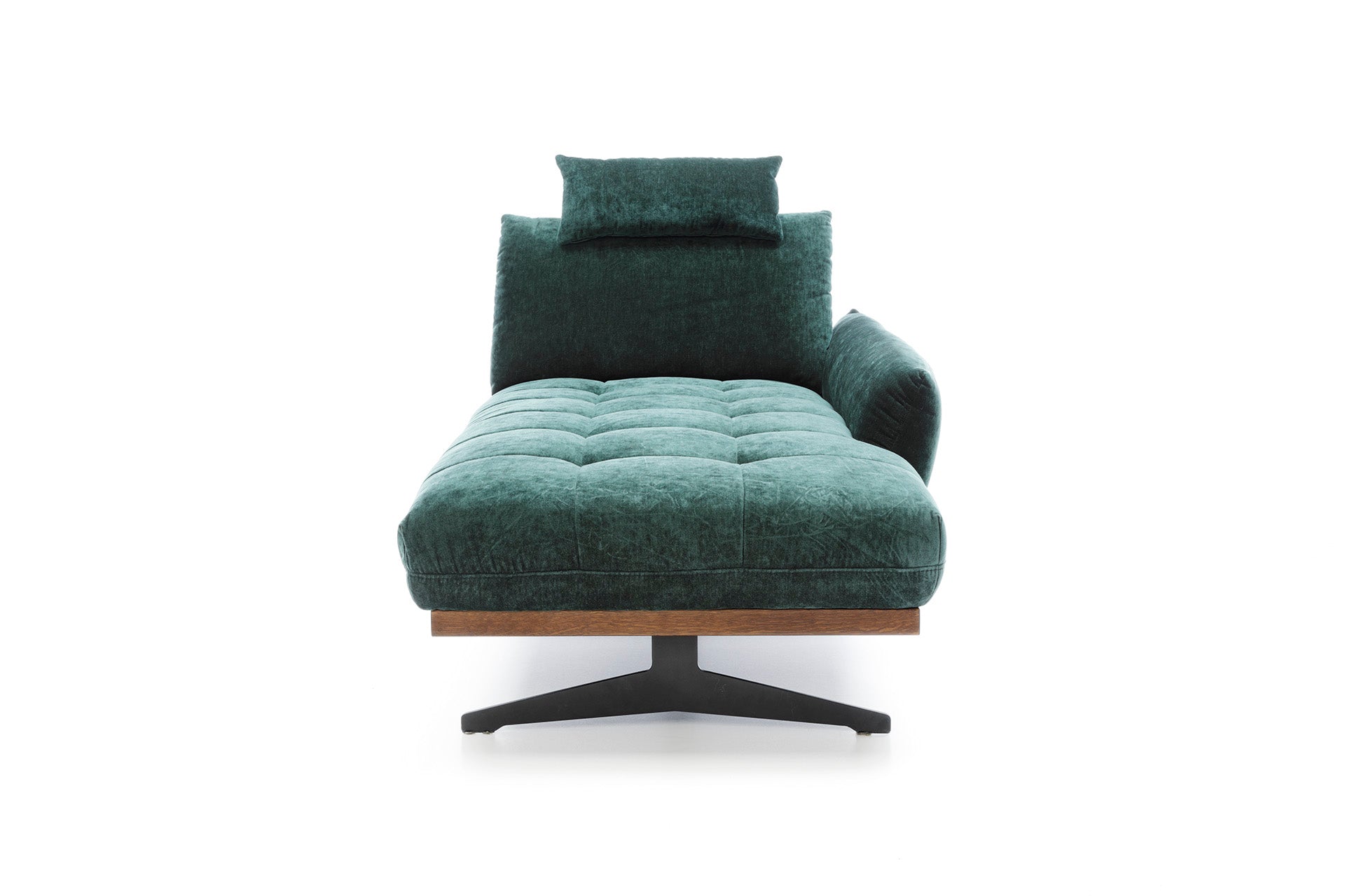 Kényelmes zöld fekvőfotel magas lábakkal