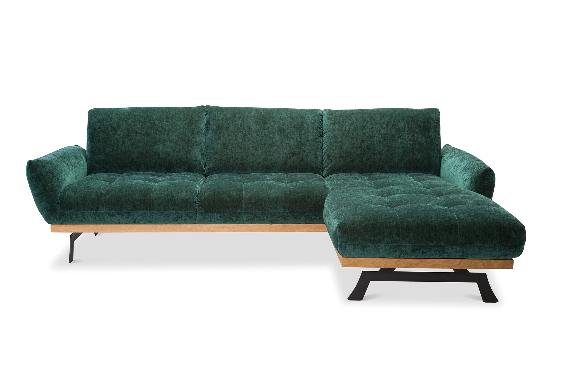 Sötétzöld bársony sarokkanapé magas lábakkal