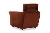 Kényelmes, rozsdabarna fotel állítható fejtámlával, hozzá illő kanapéval.