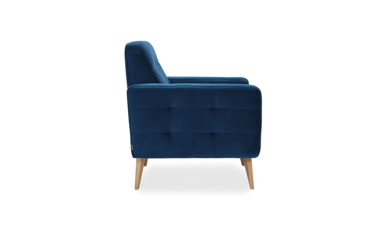 Sötétkék szövet fotel tűzésekkel