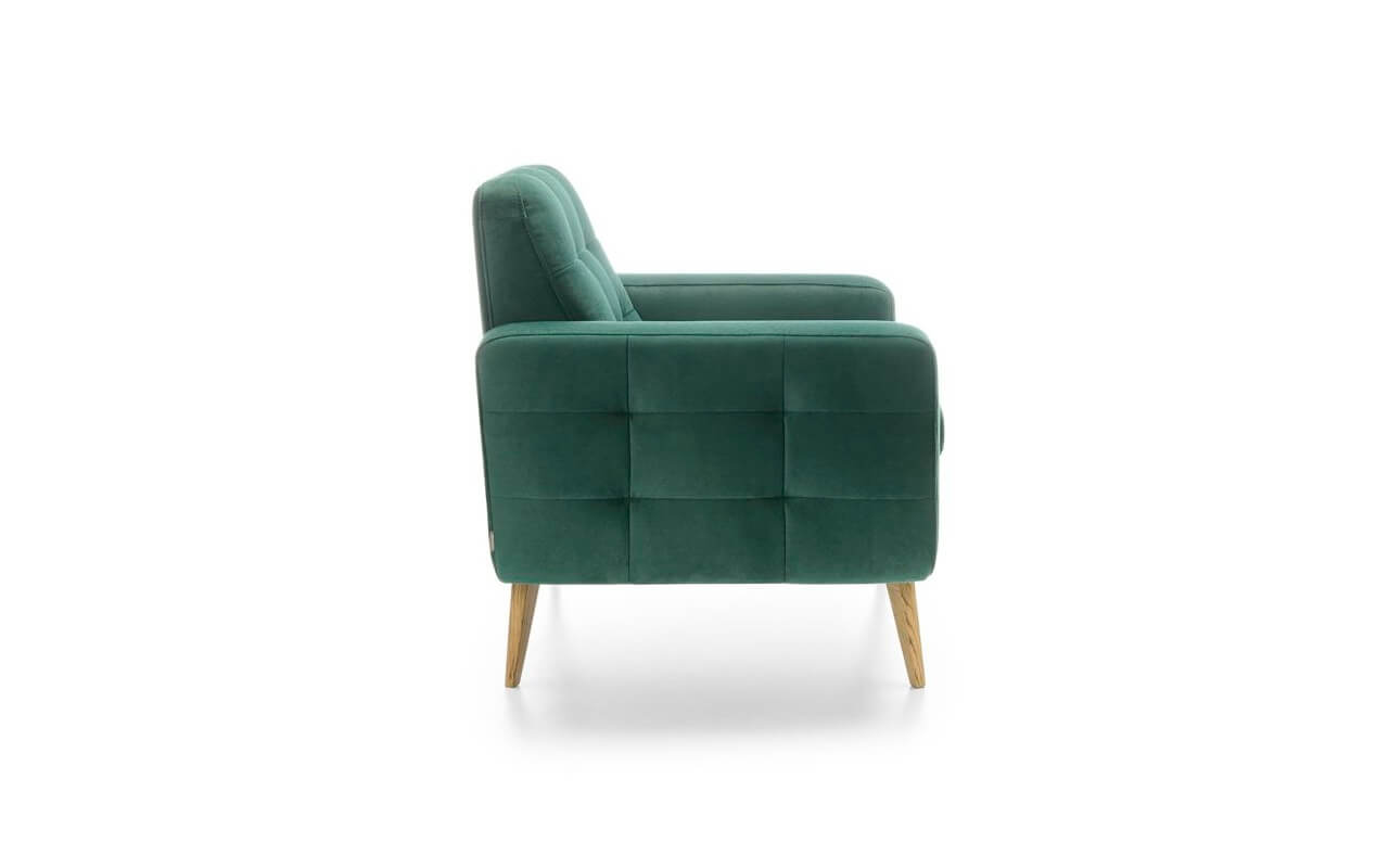 Sötétzöld szövet fotel tűzésekkel