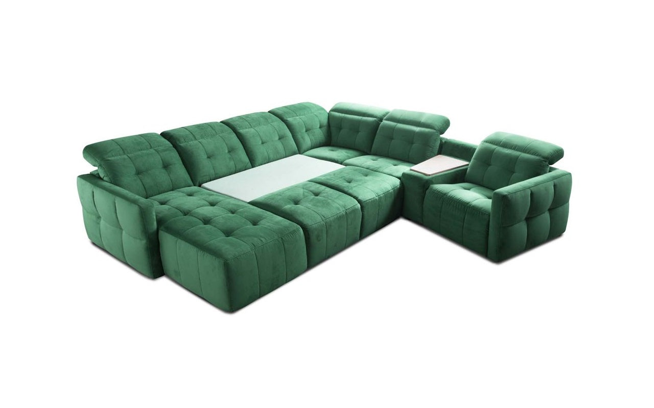 Nagy, moredn ágyazható kanapé zöld színben.