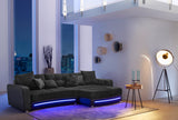 Fekete kanapé RGB világítással, hangszóróval és bluetooth kapcsolattal.